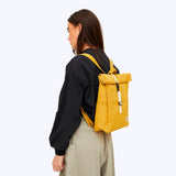 Petit sac à dos pour ordinateur en couleur moutarde